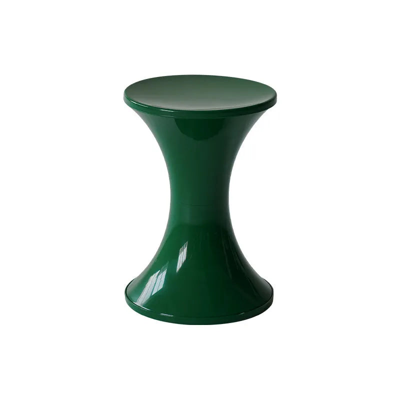 Hourglass-shaped plastic shoe changing stool with a storage seat, shown in green colour.