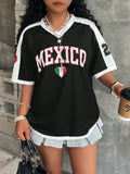 Loose fit women's V-neck short sleeve t-shirt featuring 3D raised letter printing in a solid colour.