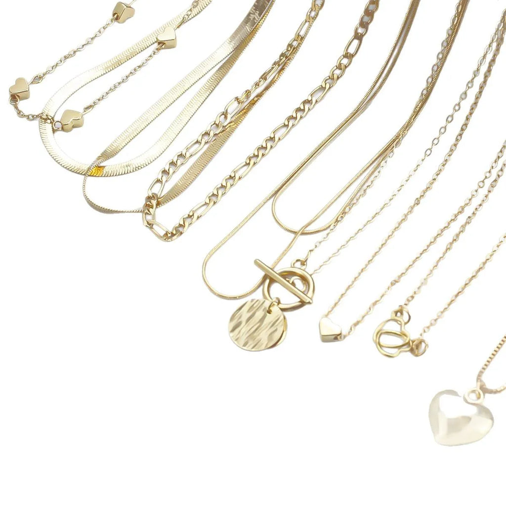 Set of ten gold electroplated women's necklaces with snake bone chains and alloy pendants.