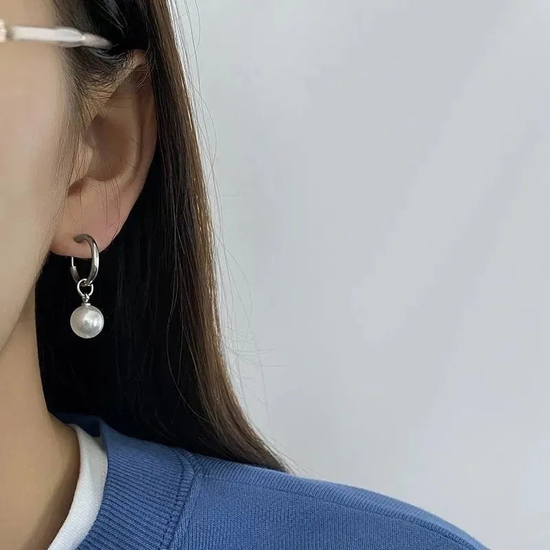 Women's alloy pearl geometric earrings with titanium steel posts and round design