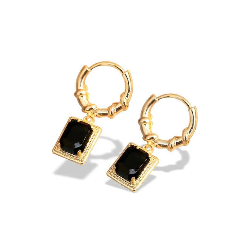 A pair of geometric quadrilateral copper earrings with black zircon stones in a French court retro style, colour E2506 Black.