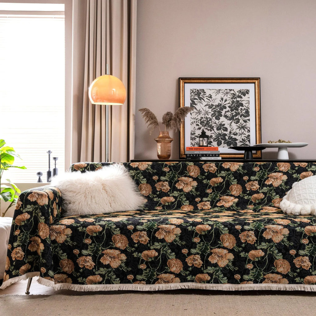 American country retro jacquard sofa cover in a cherry pattern on a white background, draped over a sofa.