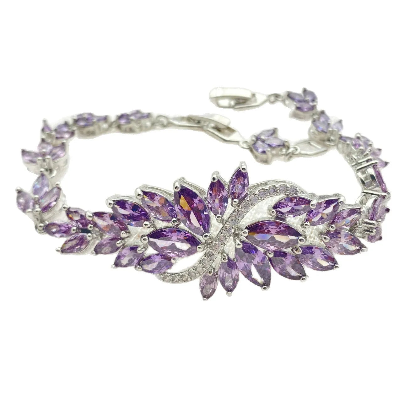 Gold electroplated bracelet with coloured zircon stones and ice flowers pattern on copper.