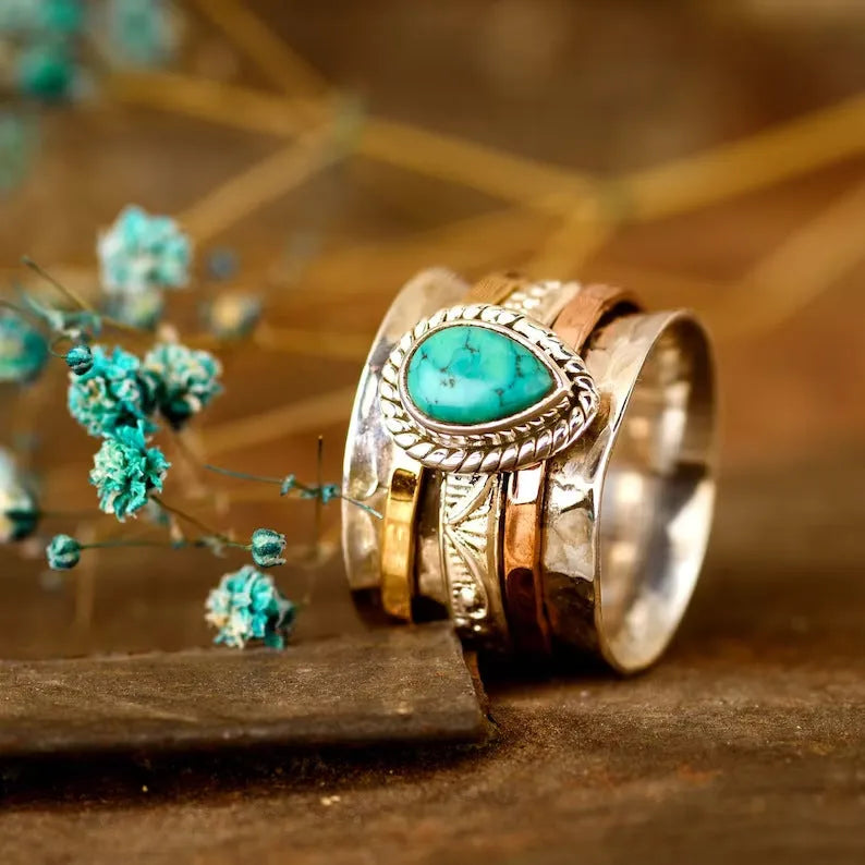 Retro alloy ring with green pine tree design and three-colour antique electroplated finish.