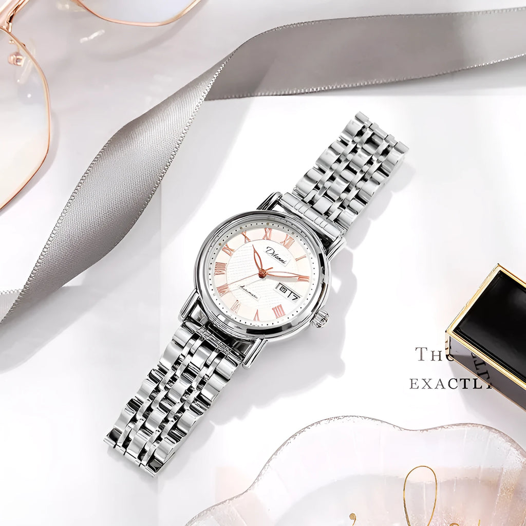 Automatic women's mechanical fashion watch with a 12mm thick case on a steel bracelet.