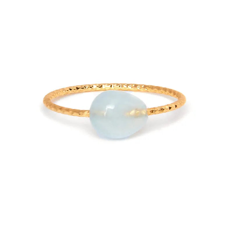 Geometric women's ring with a coloured agate stone in a modern setting.