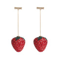 Geometric zinc alloy strawberry earrings for women in red with spot drill detail.