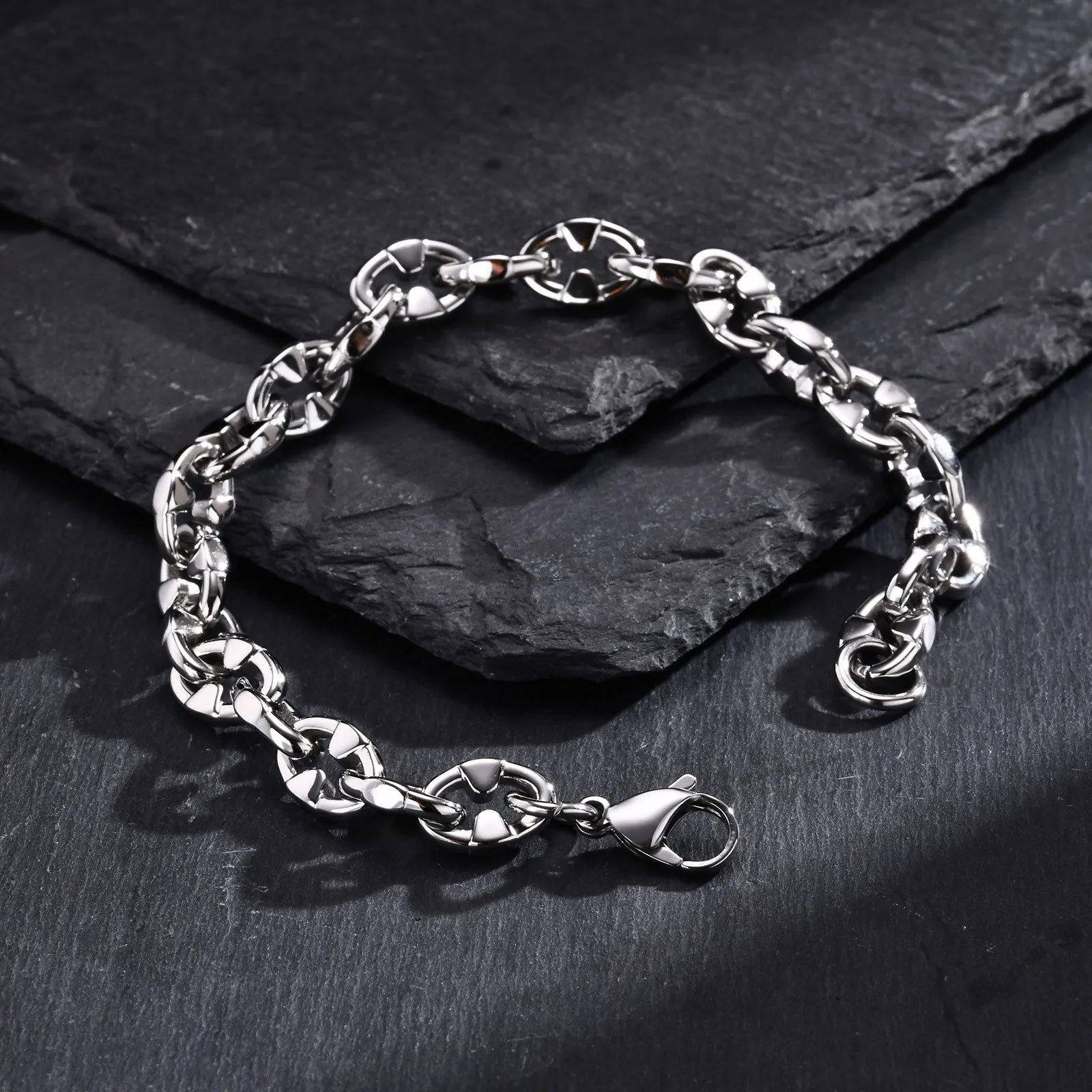 Handmade thick stainless steel geometric chain bracelet for men, shown in steel colour.