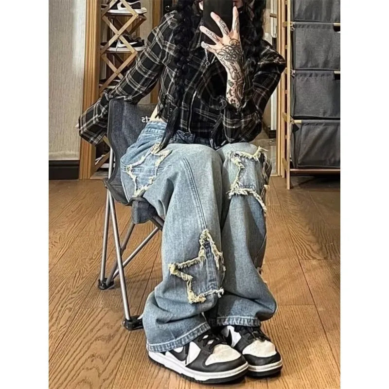 Blue high-waisted straight-leg women's jeans on a model, showing the front and side fit.