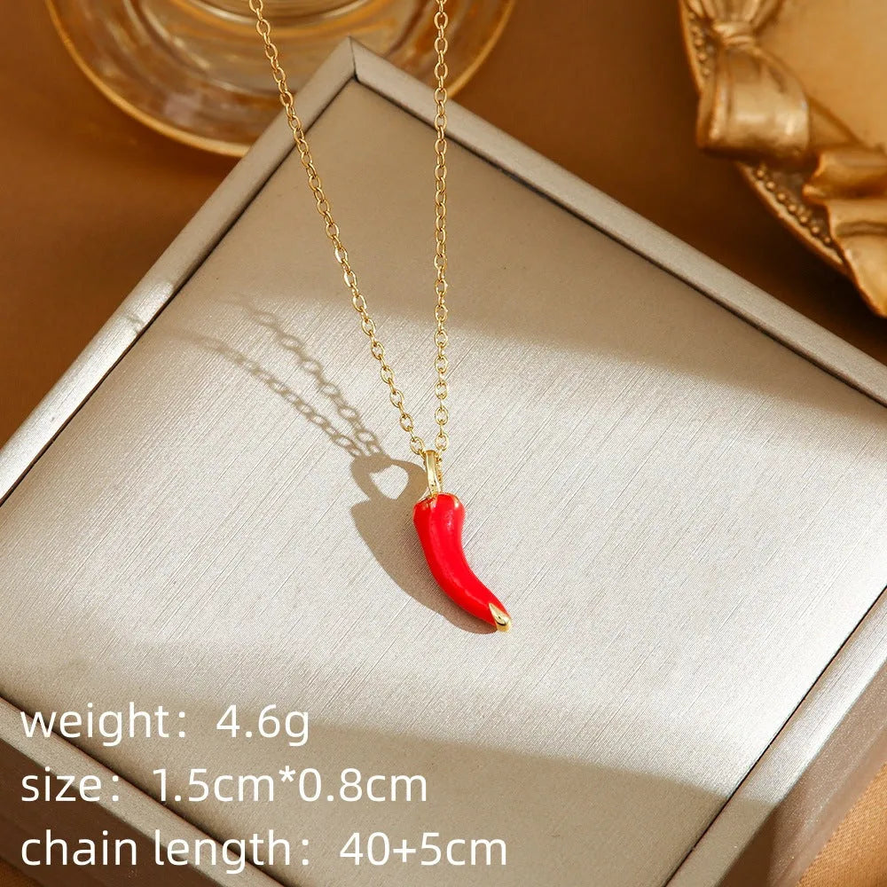 Titanium steel delicate necklace with indie cherry, strawberry, and pepper charms on an O-ring chain, shown in golden and steel colour variations.
