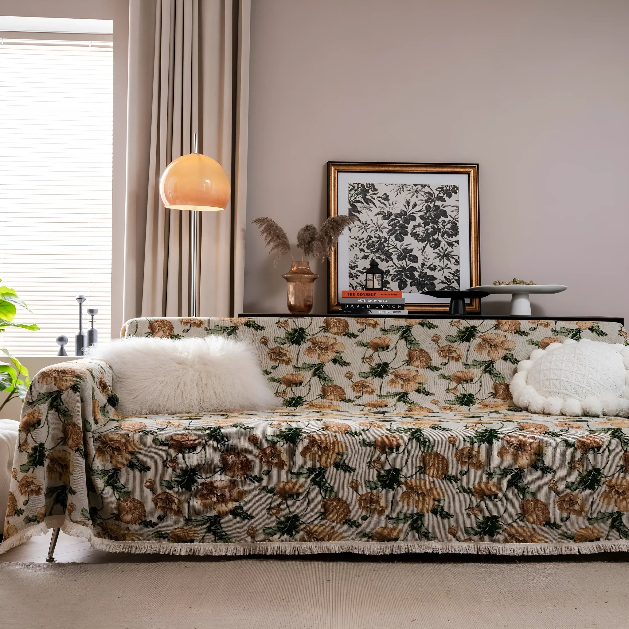 American country retro jacquard sofa cover in a cherry pattern on a white background, draped over a sofa.