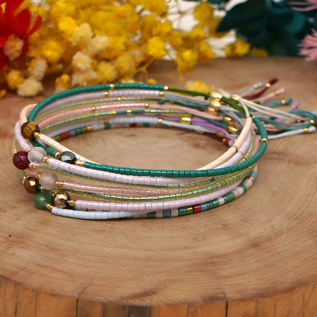 Women's handmade Bohemian bracelet with colourful geometric glass beads.