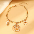 Spiral donut alloy jewellery set with necklace, bracelet, and earrings in gold or silver electroplated finish