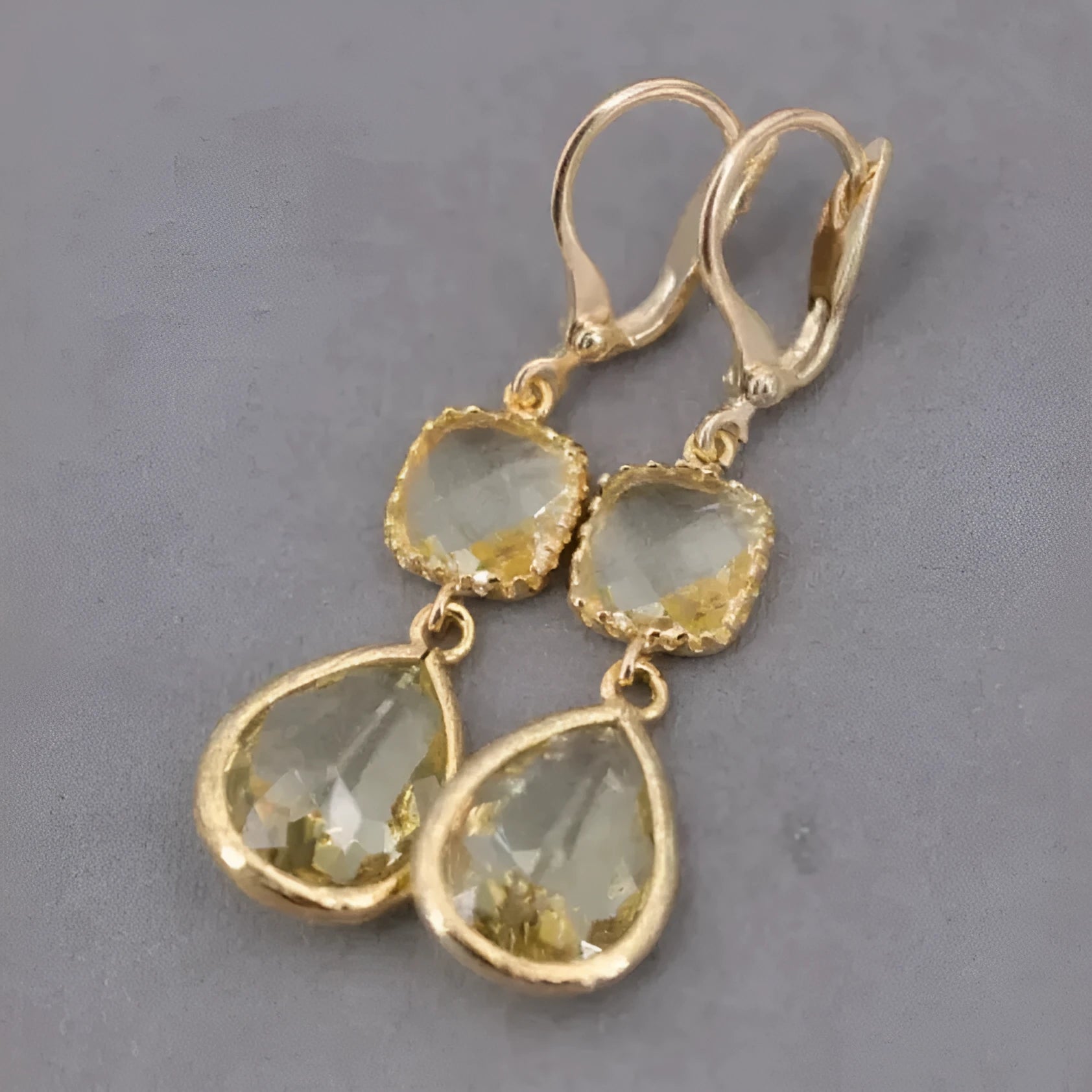 Gold retro earrings with long crystal fringe and geometric water droplet design