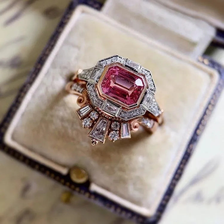 Rose gold geometric women's fashion ring in a retro style on a hand.