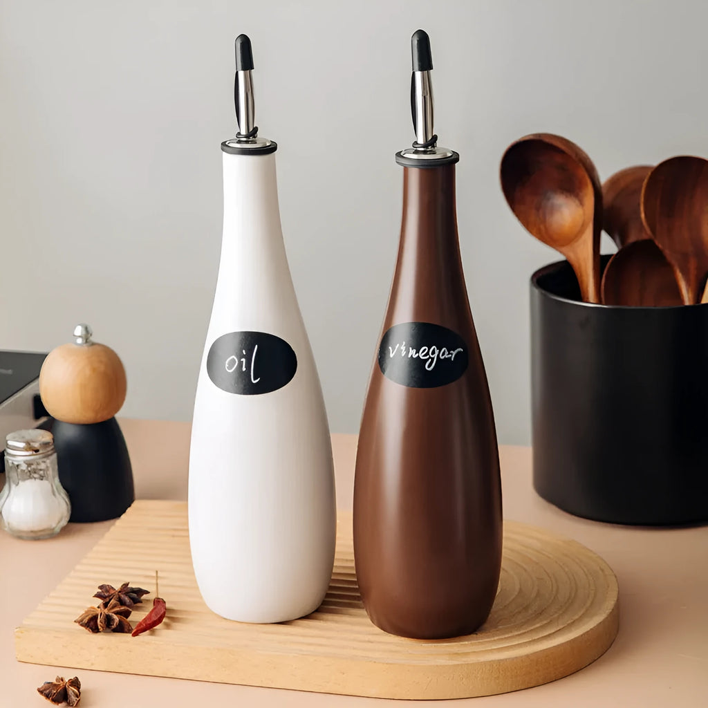 Ceramic oil pot with plastic funnel and brush in black, coffee, or white colour, 650ml capacity