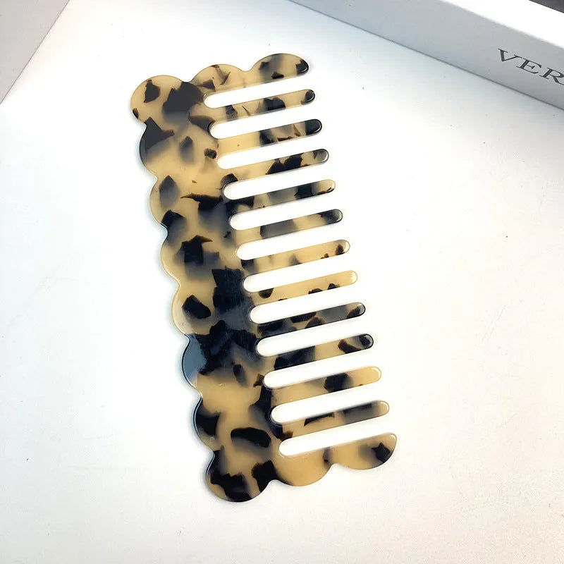 Acetate geometric wave hair comb in apricot colour with retro design elements