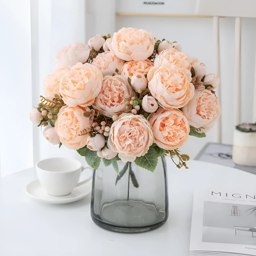 Silk artificial peony bouquet in champagne and sand red colours for home or wedding decoration.