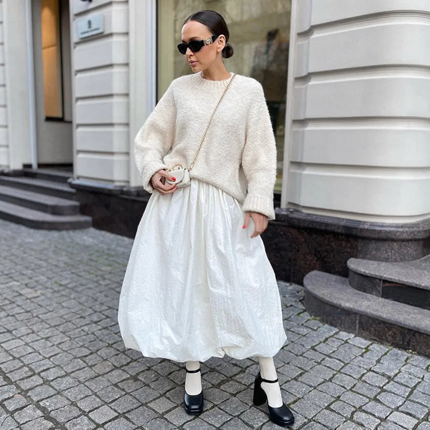 Women's solid colour cotton long skirt shown in black and white options
