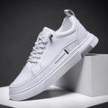 Men's white skateboard shoes with microfiber upper and elastic band closure