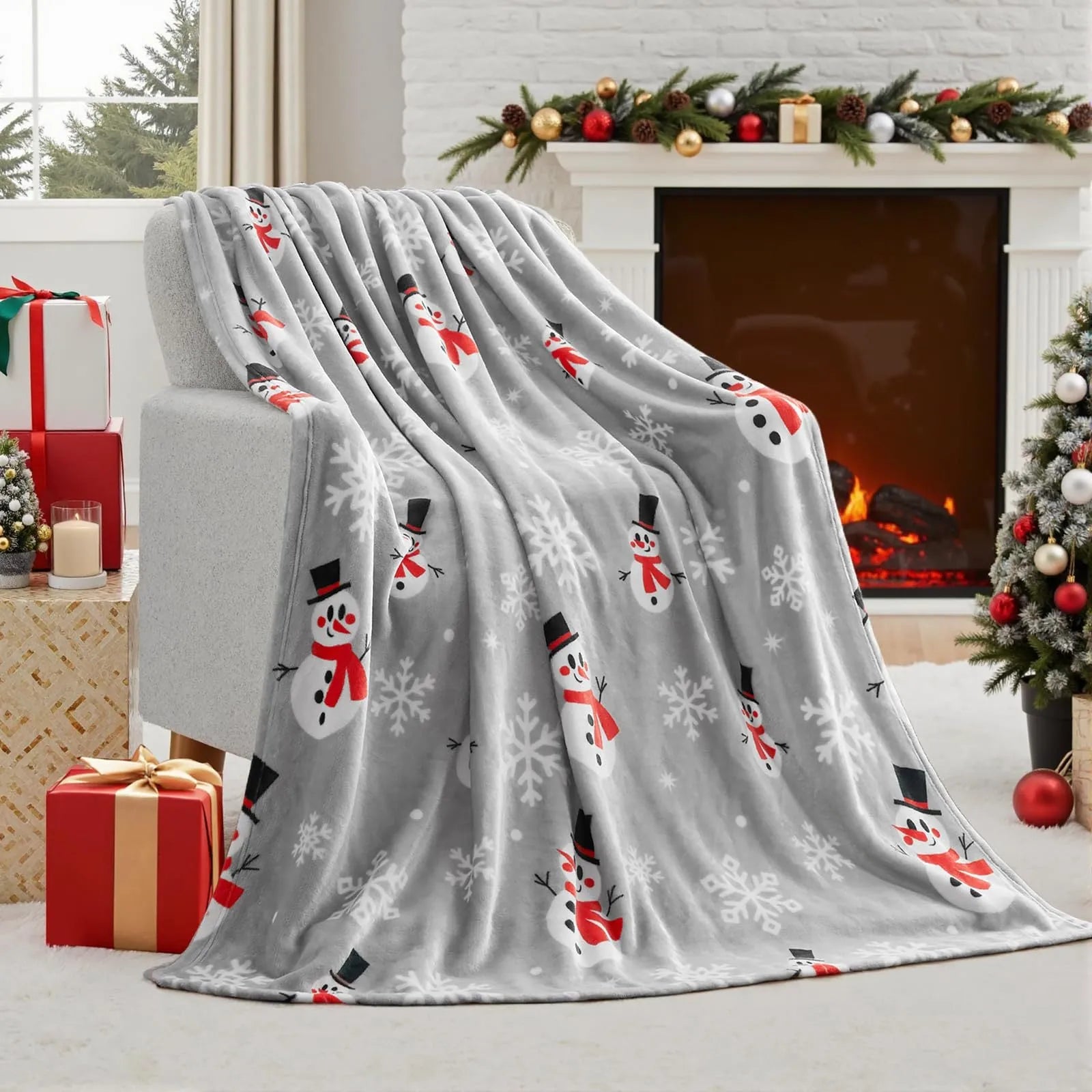 Soft red polyester flannel Christmas blanket draped over a sofa