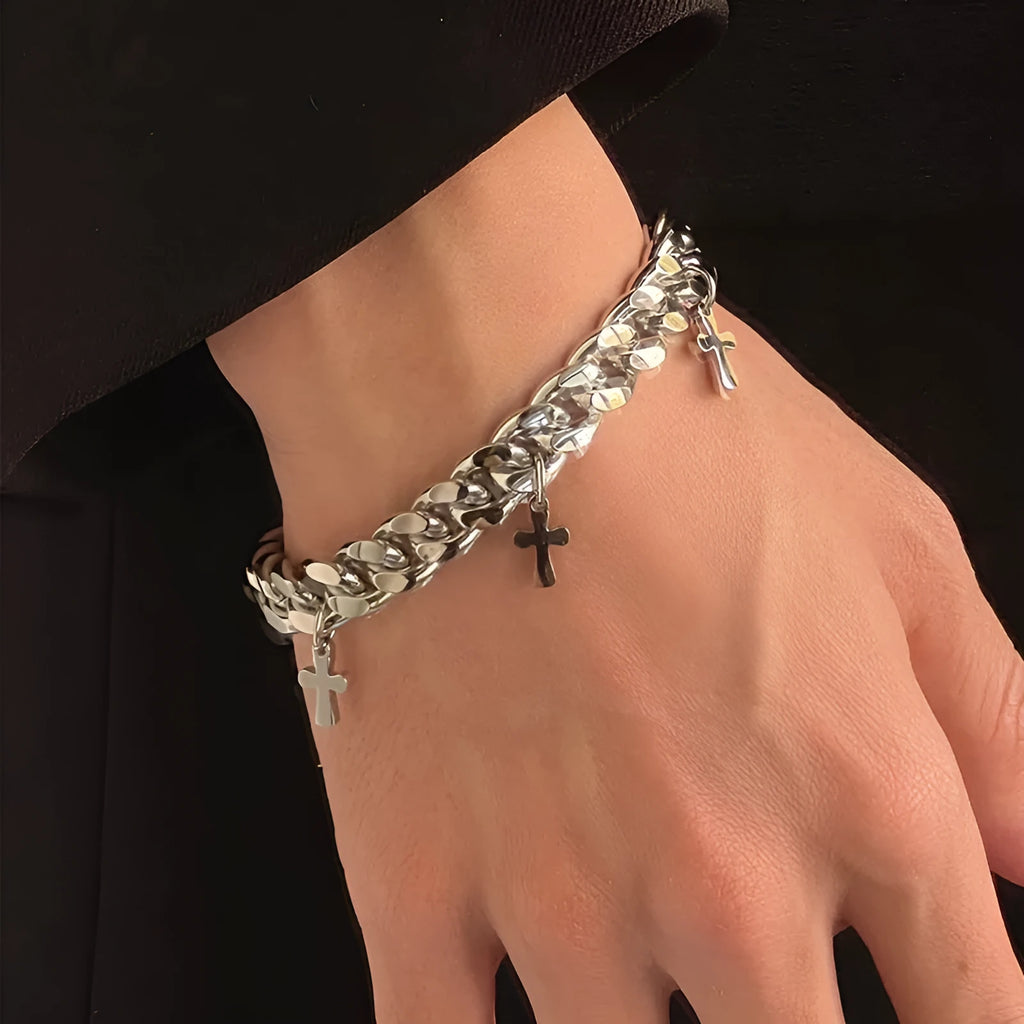 Men's titanium steel bracelet showing a geometric cross design on a simple band.