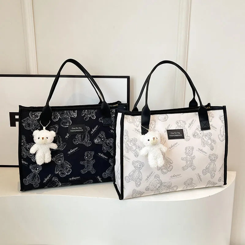 Women's soft canvas tote bag in horizontal square shape with rhombus pattern detail
