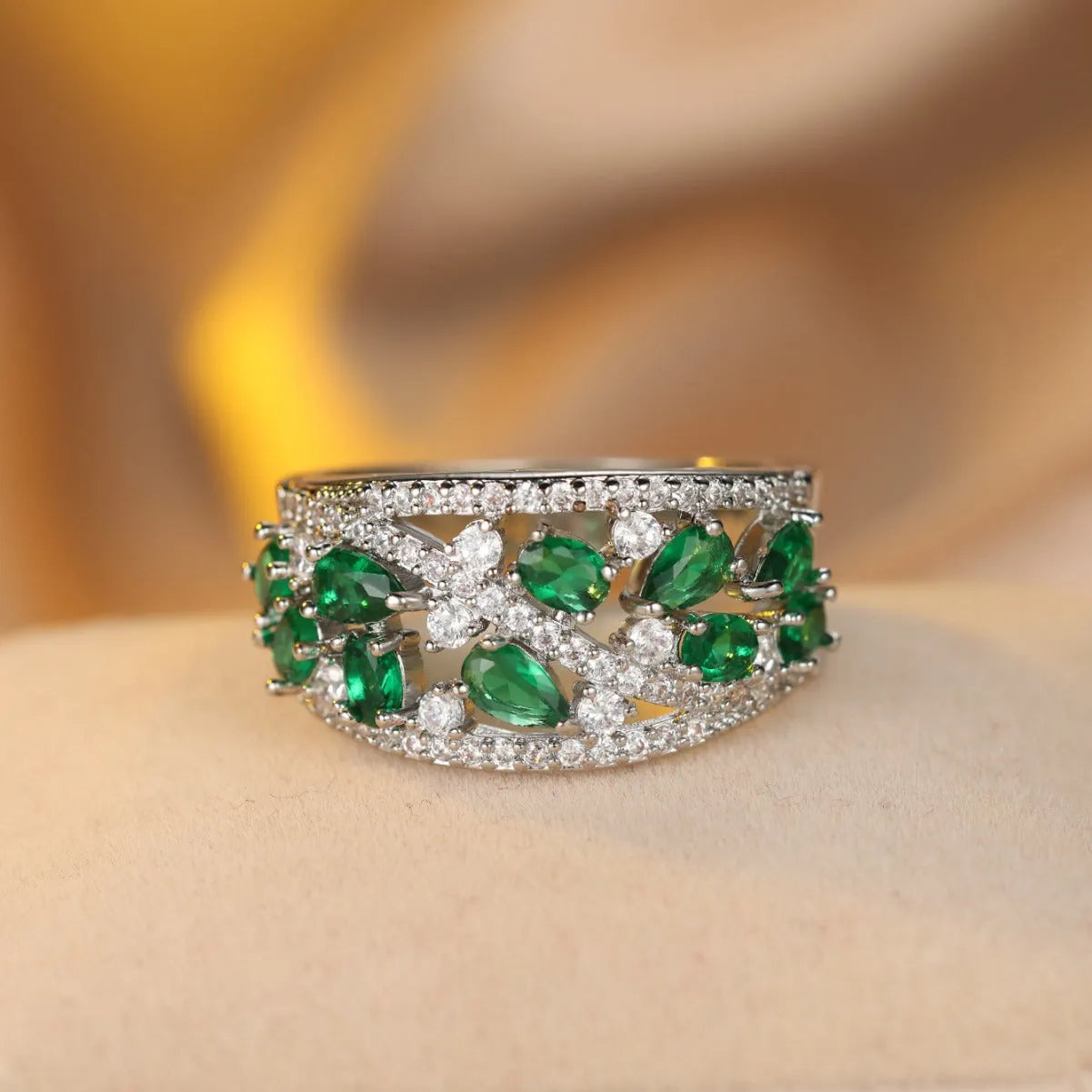 Women's round hollow fashion ring in gold or platinum with a diamond or blue sapphire stone.