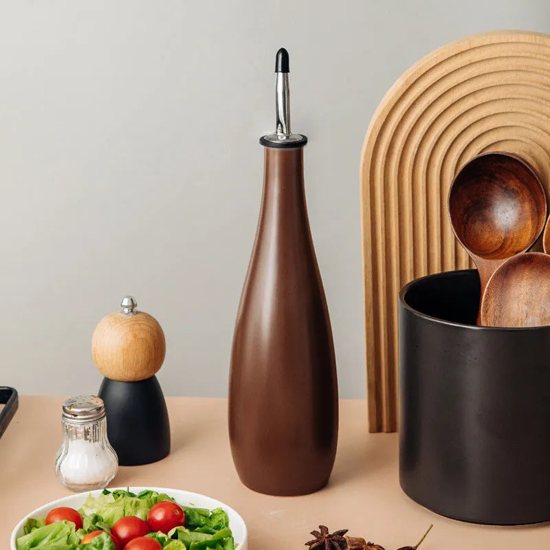 Ceramic oil pot with plastic funnel and brush in black, coffee, or white colour, 650ml capacity