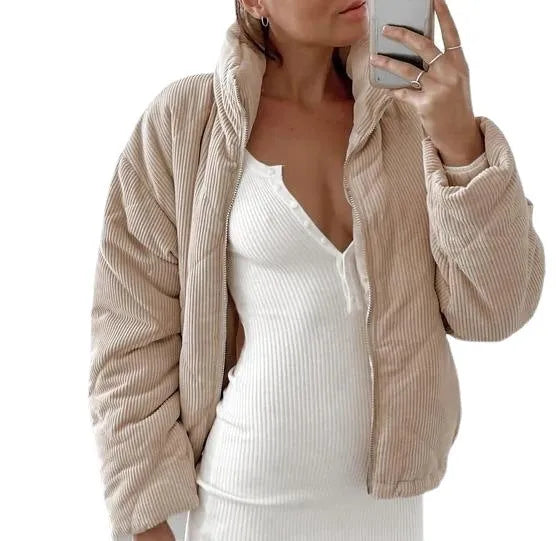 Women's apricot corduroy jacket with stand collar and front zipper on mannequin