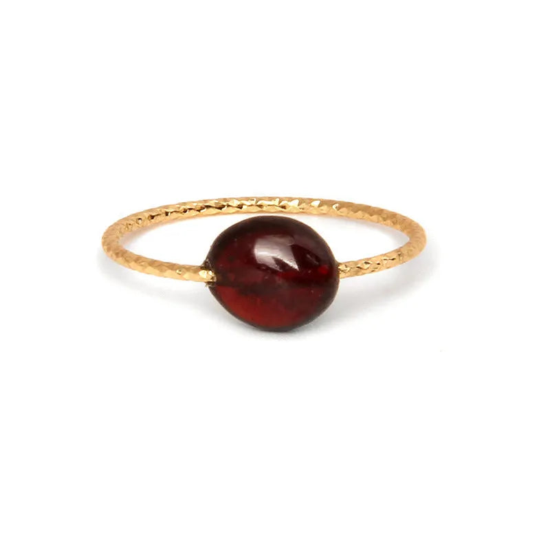 Geometric women's ring with a coloured agate stone in a modern setting.