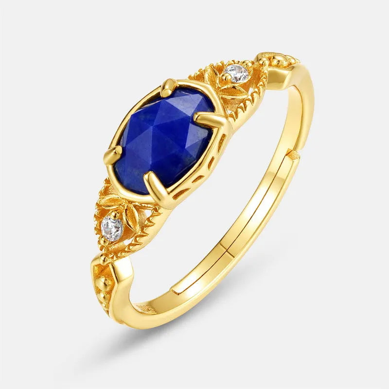 Geometric silver alloy ring with deep blue lapis lazuli stone in elliptical setting