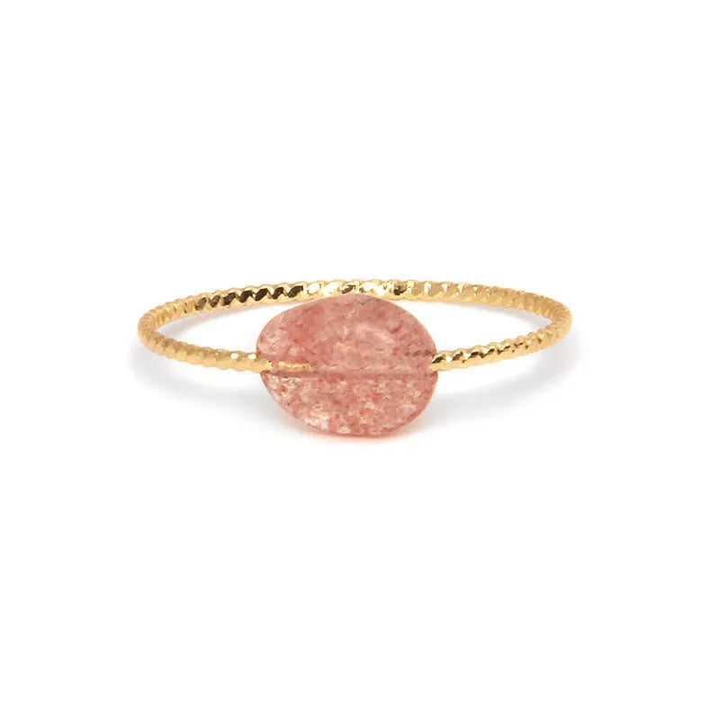 Geometric women's ring with a coloured agate stone in a modern setting.