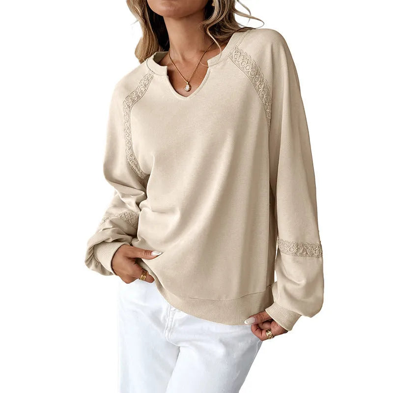 Women's half-open collar lace detail long sleeve sweater in a solid colour on a hanger.