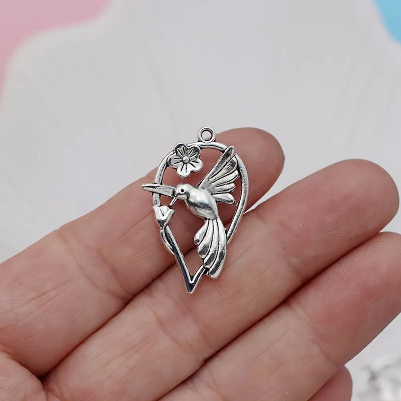 Alloy Magpie bird charm pendant with electroplated P234 colour finish for DIY jewellery.