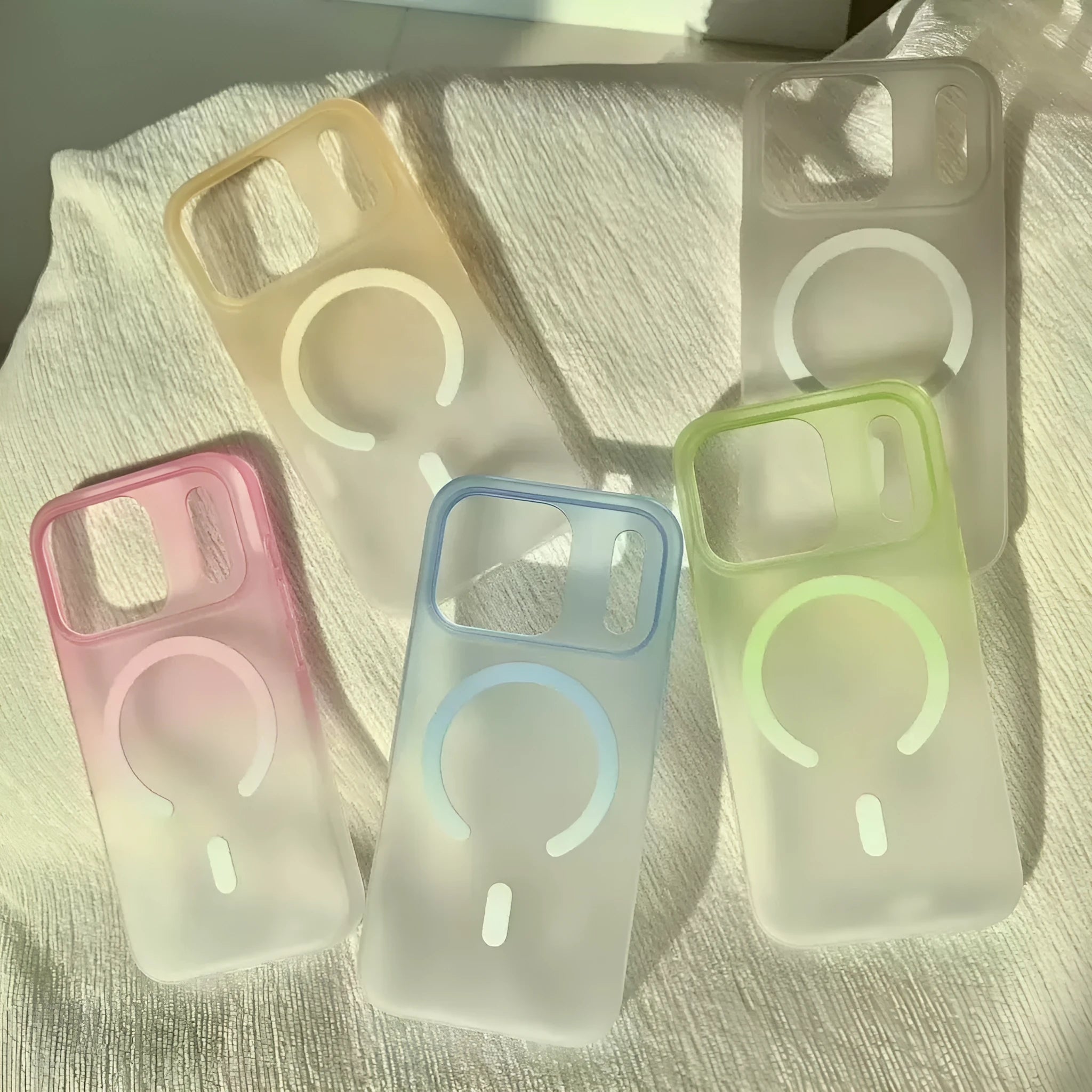 Frosted gradient blue magnetic suction case for iPhone, showing ultra-thin PC construction.