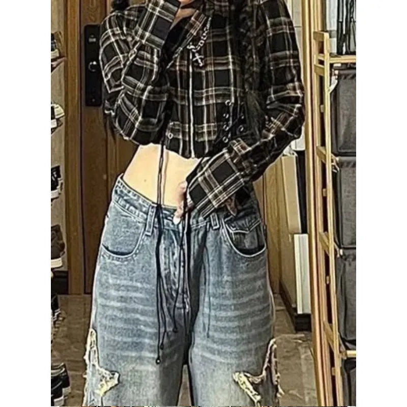 Blue high-waisted straight-leg women's jeans on a model, showing the front and side fit.