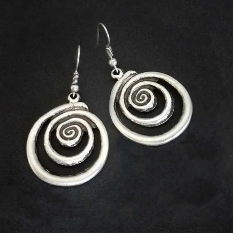 Silver geometric spiral distressed alloy earrings with national style design measuring 2.6 cm wide by 5 cm long