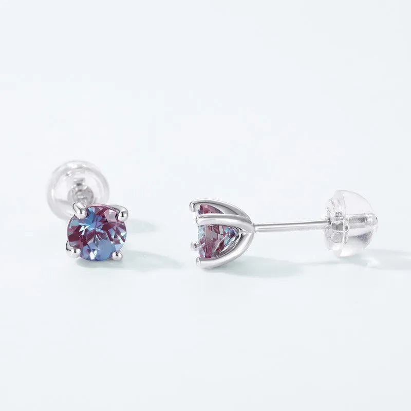 A pair of simple geometric 925 silver ear studs with round cultivated alexandrite stones.