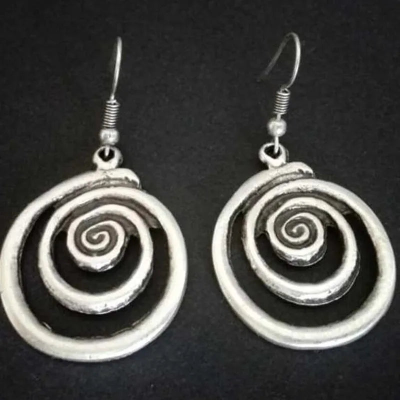 Silver geometric spiral distressed alloy earrings with national style design measuring 2.6 cm wide by 5 cm long