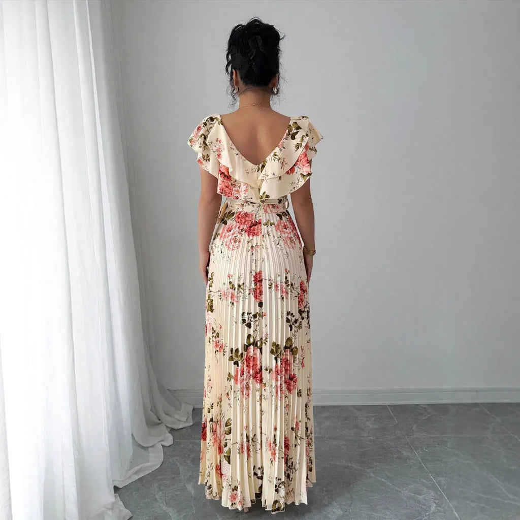 Apricot floral print women's dress with V-neck, ruffle sleeves, and a high-waisted A-line skirt.