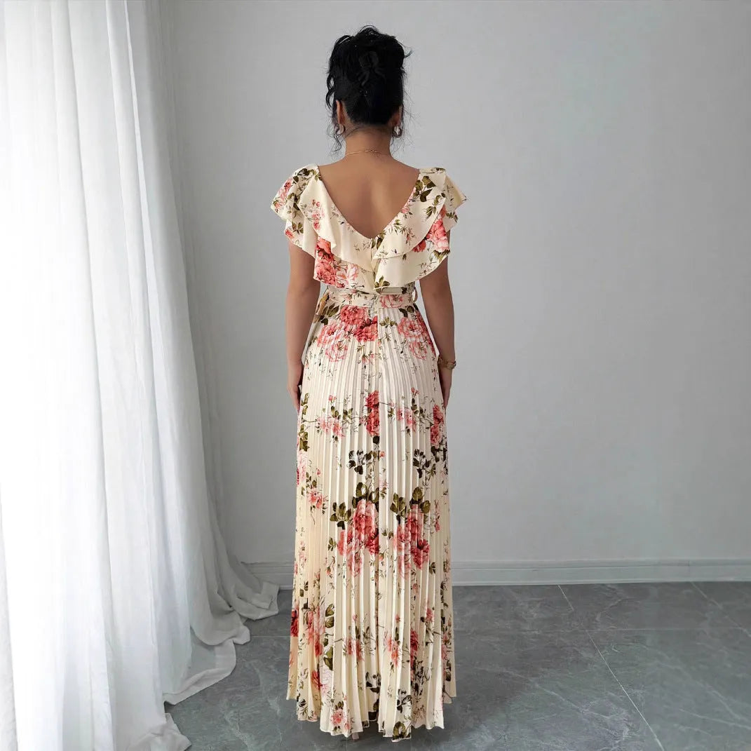 Apricot floral print women's dress with V-neck, ruffle sleeves, and a high-waisted A-line skirt.
