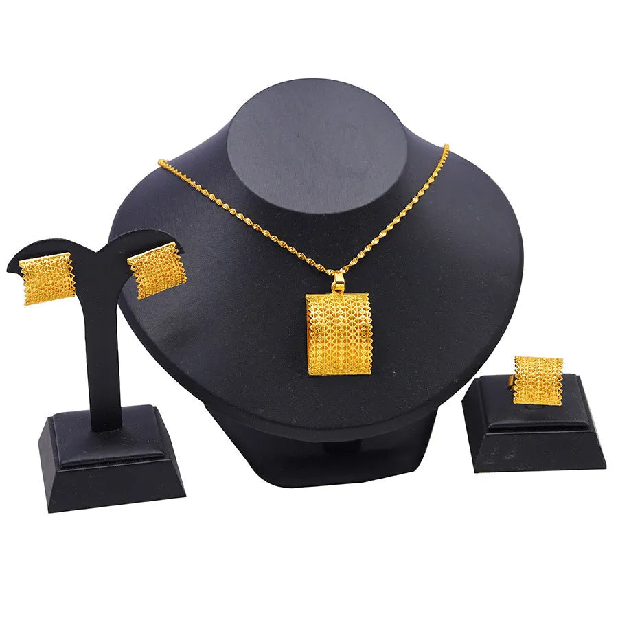Golden bridal jewellery set with copper necklace, earrings, and ring wedding accessories