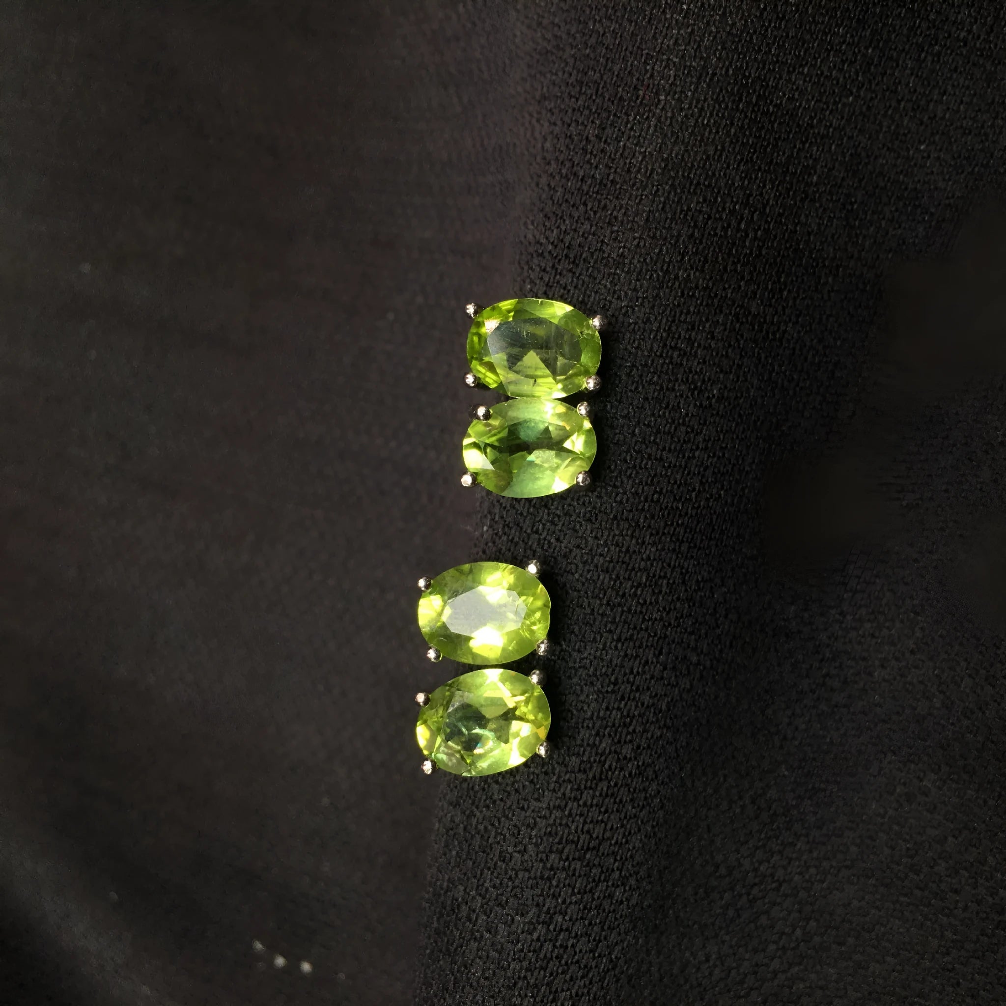 Natural grass green olivine faceted stud earrings in S925 sterling silver setting.