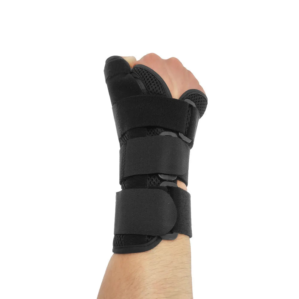 Carbon fibre sports wrist guard with thumb strap in black and grey colours