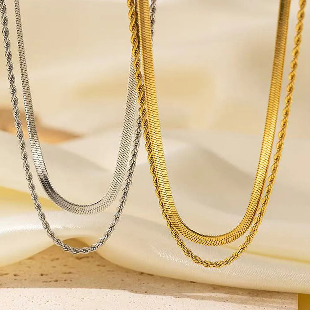 Women's retro double-layer twist necklace with geometric pendant on a snake bone chain