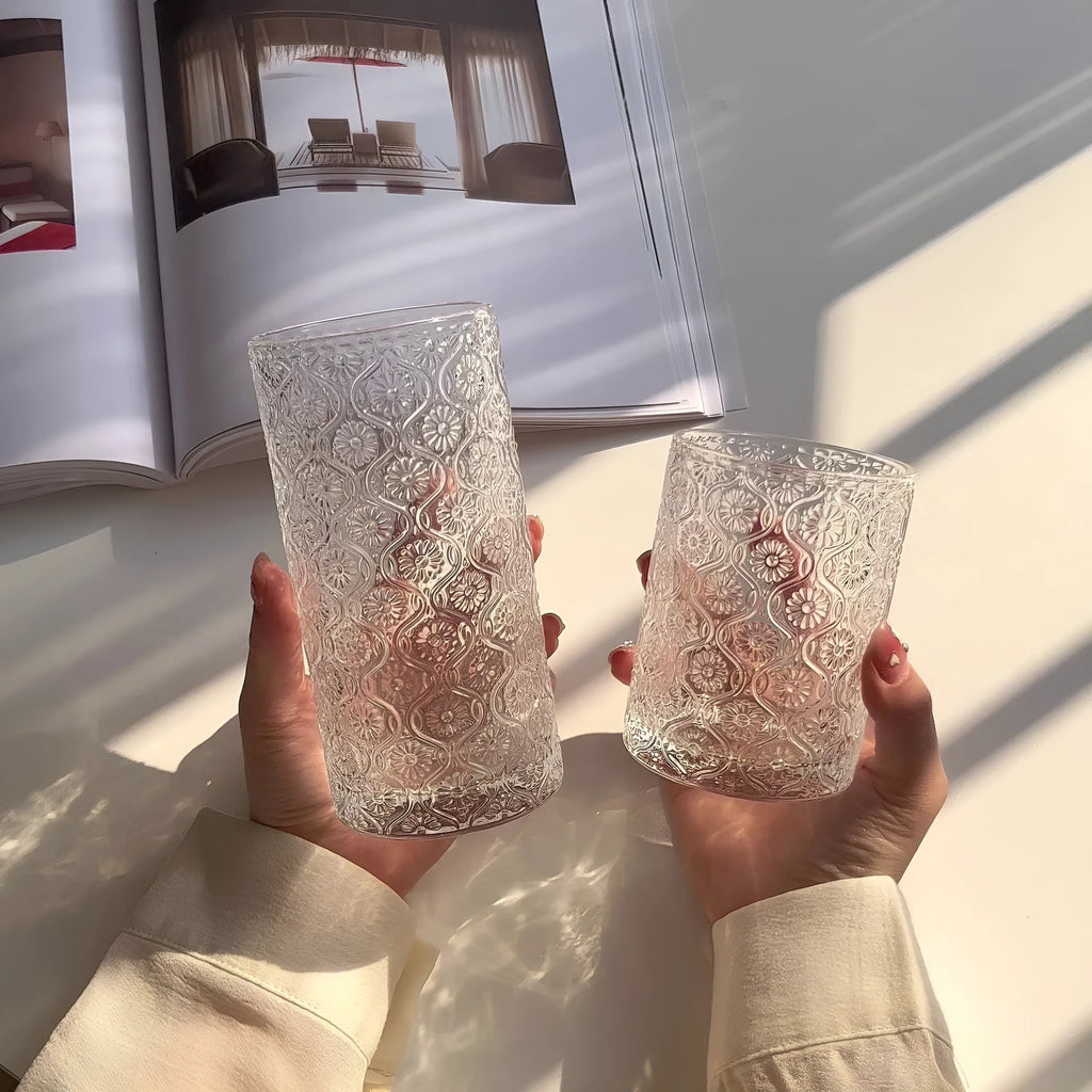 A begonia-carved straight round glass water cup in a solid colour, shown in short 250ml and tall 380ml sizes.