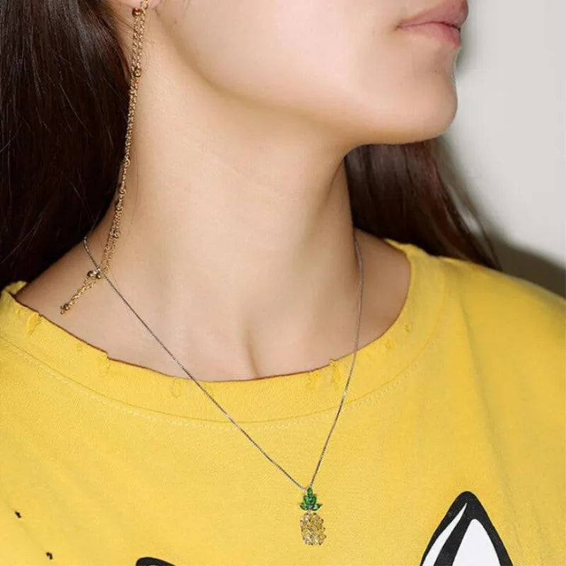 Silver Korean women's necklace with a geometric pineapple and diamond charm on an adjustable chain.