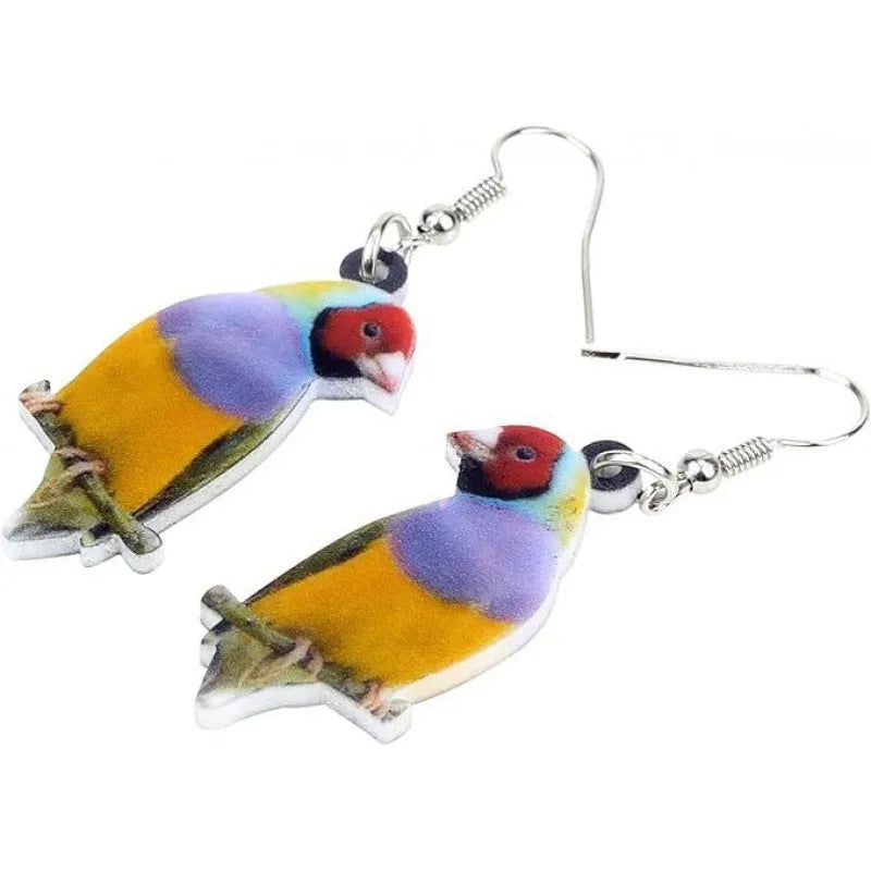 Acrylic blue titmouse bird and snake design pendant earrings on a white background.