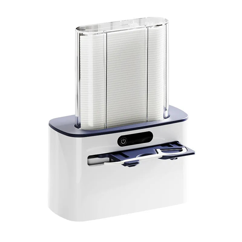Dark gray automatic electric dental floss box with pop-up floss dispenser on a bathroom counter.